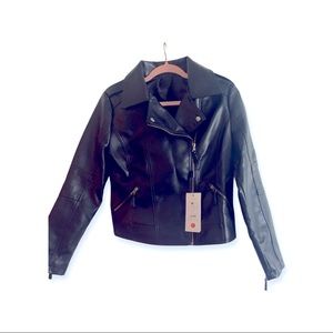 This is a brand new never worn faux leather jacket